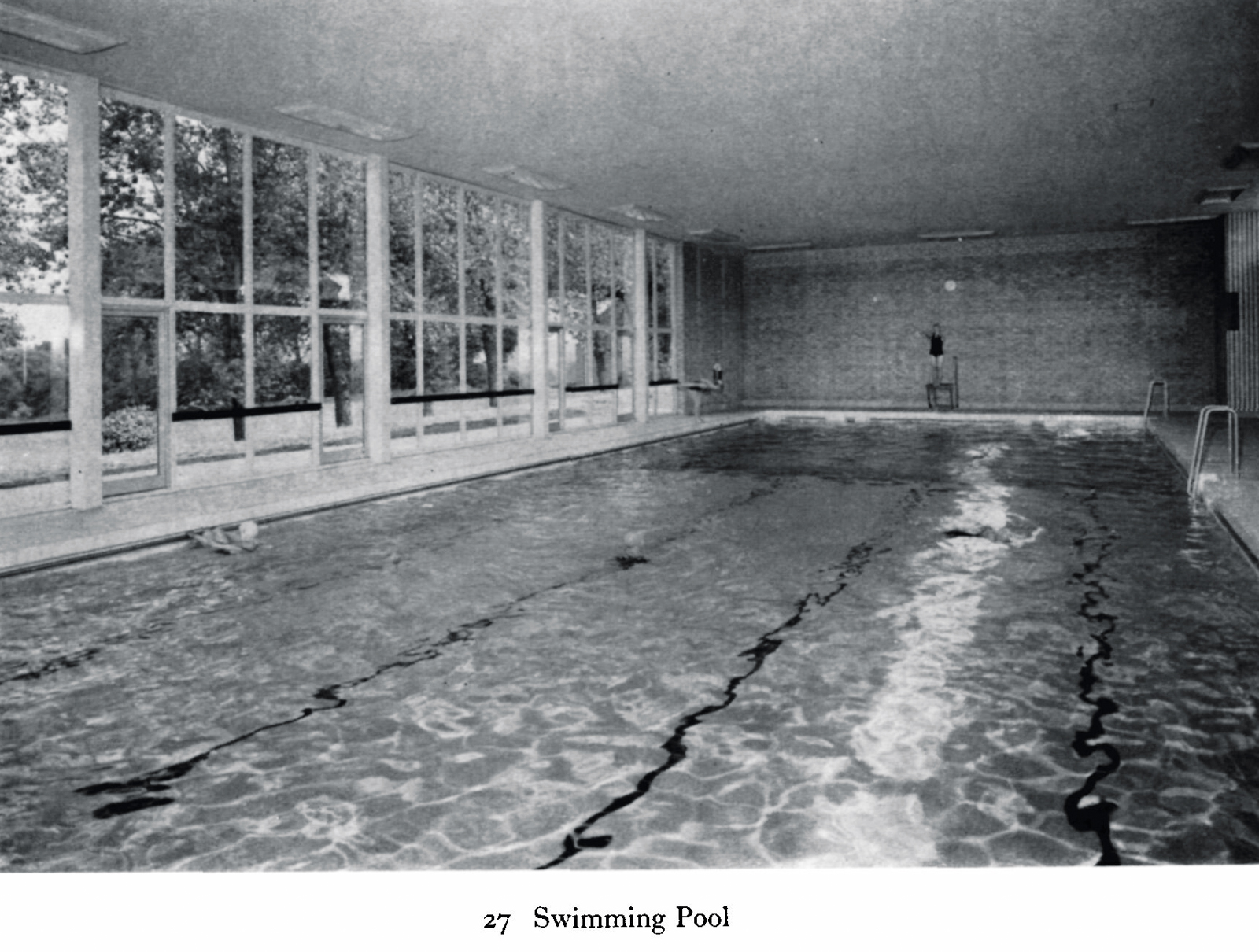 a black and white photo of the Swimming pool interior